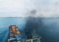 Container Ship Emitting Black Smoke in the Ocean