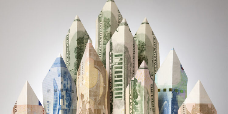 Skyscrapers made of paper currency.